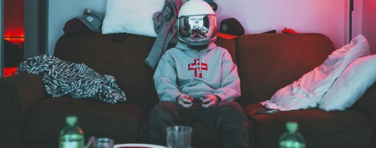 A man in a helmet with a joystick