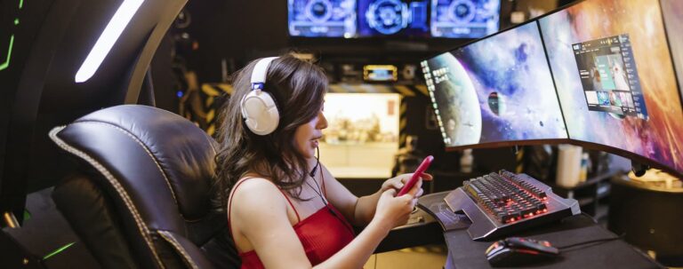 A girl in front of the monitors